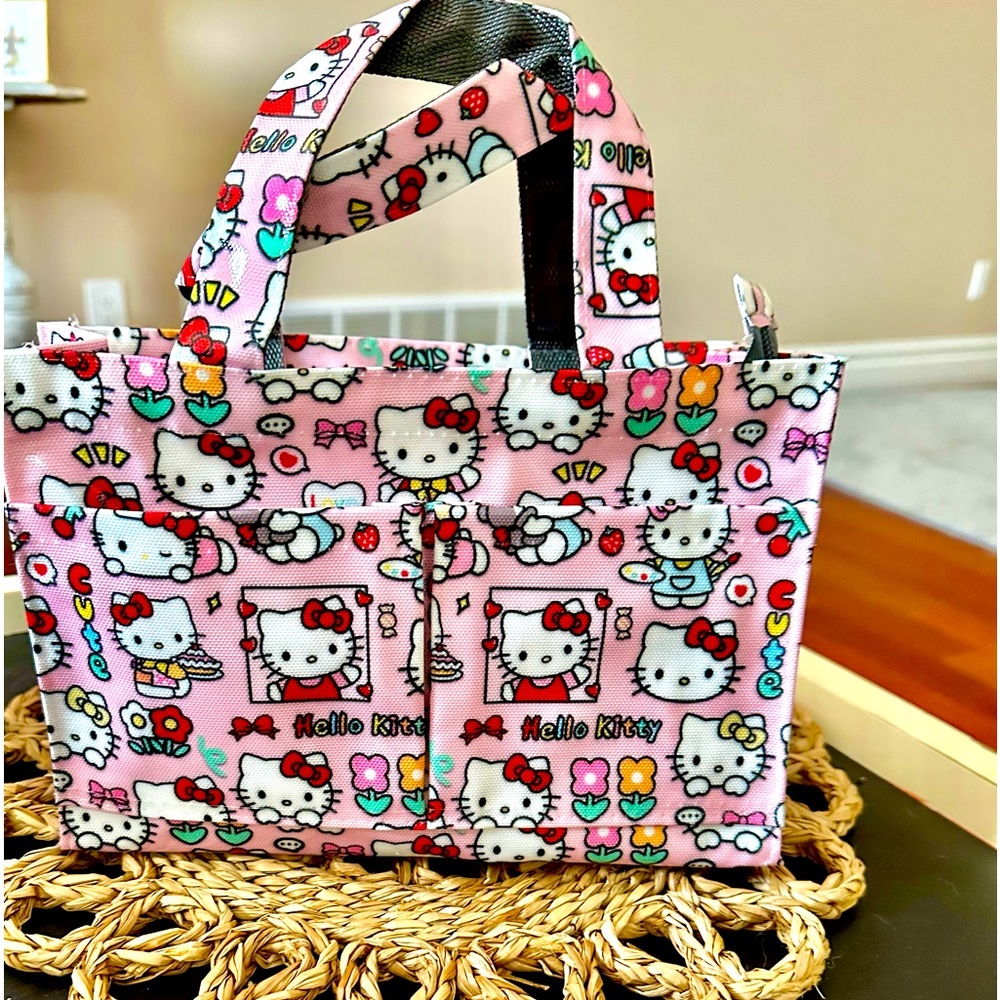 💗🆕Hello Kitty waterproof bag with Mini notebook and Pen! Adorable! New!